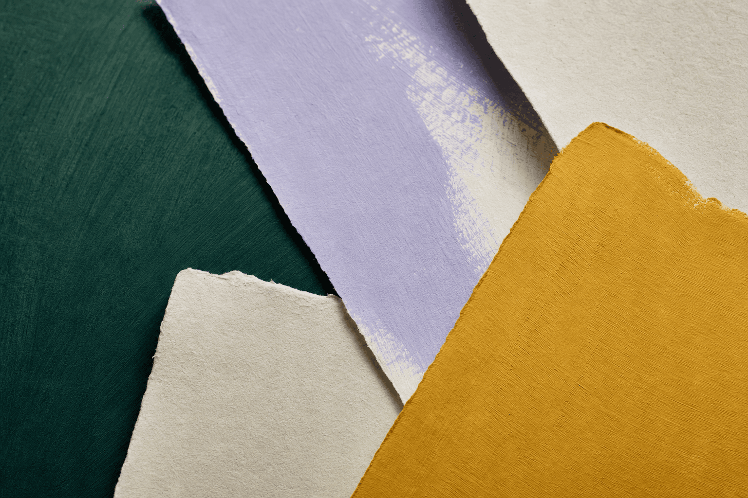Layered painted paper studies in moss, lilac, yellow, and cream